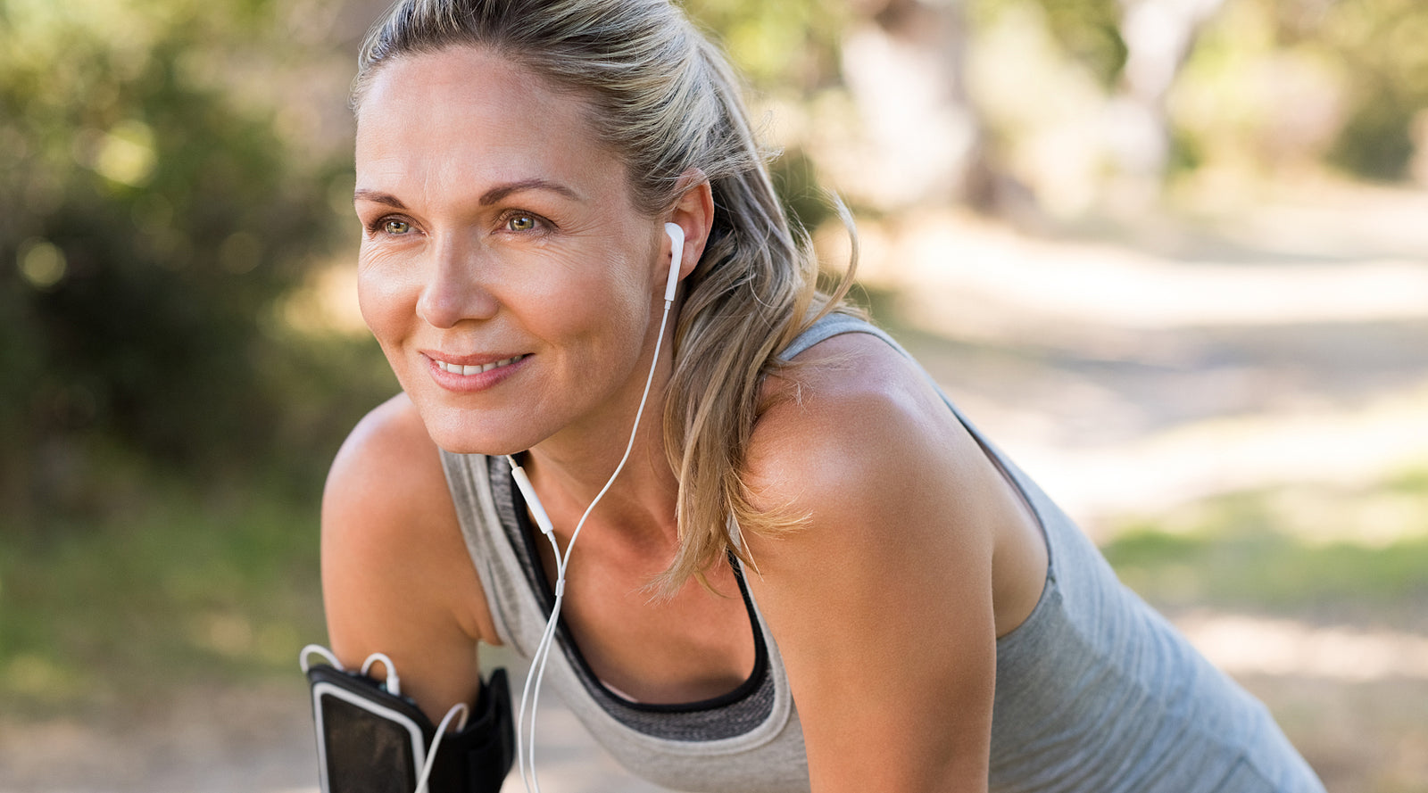 Person in a plank position outdoors.