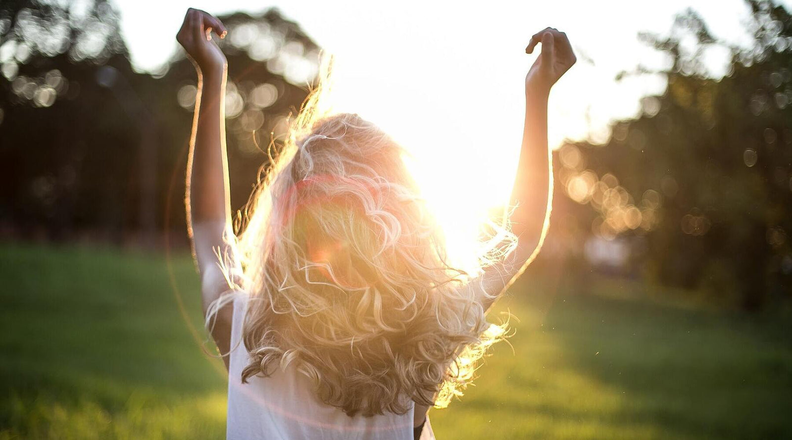 Woman dancing in sun