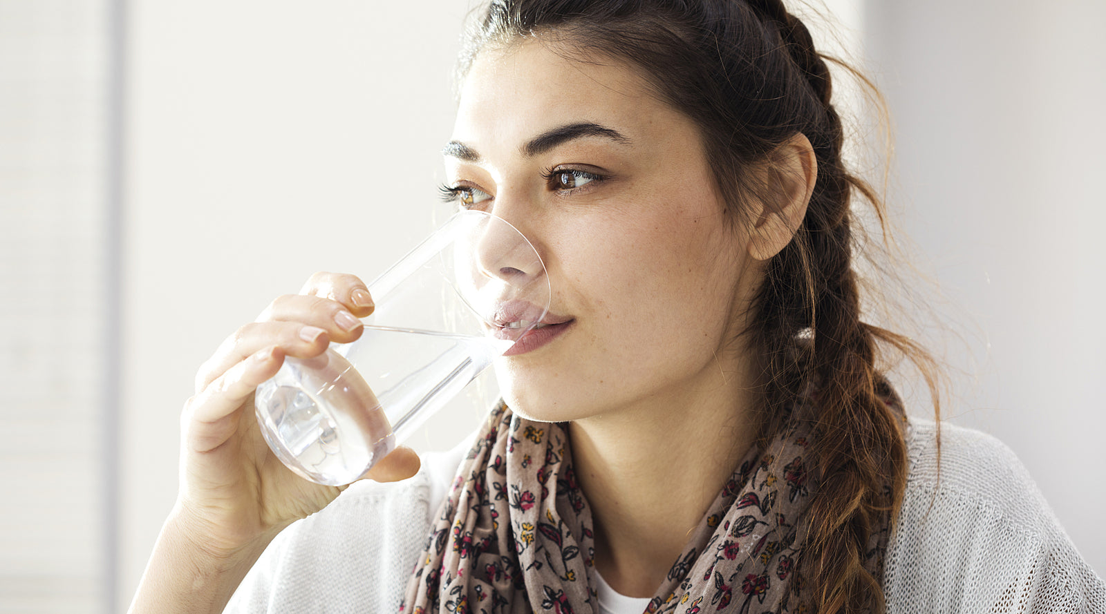 Young woman drinking water