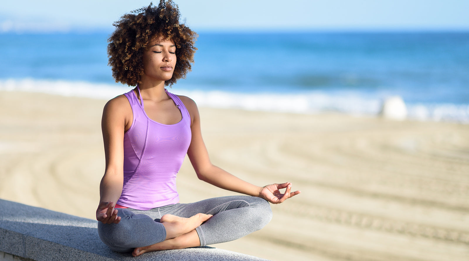 Person pinching their belly